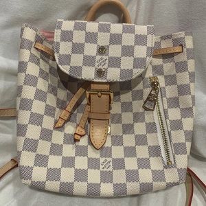 White checkered backpack